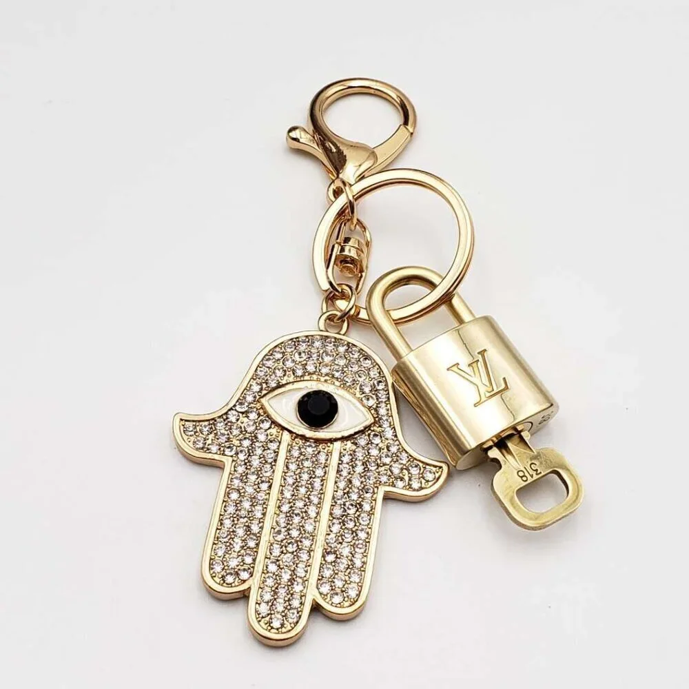 Louis Vuitton Gold Lock 🔑 Authentic LV Padlock + Bag Unbranded Evil Eye Charm